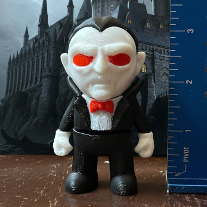 A collection of 3D printed horror-themed minifigures, featuring various characters in different poses and outfits typical of horror imagery.