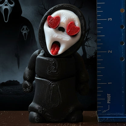 A collection of 3D printed horror-themed minifigures, featuring various characters in different poses and outfits typical of horror imagery.