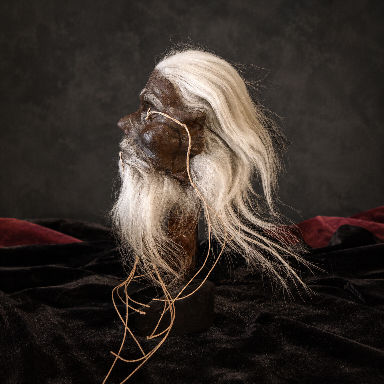 long white hair and beard alpaca hide shrunken head replica side profile
